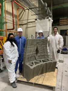 Students with a 3D printed concrete project